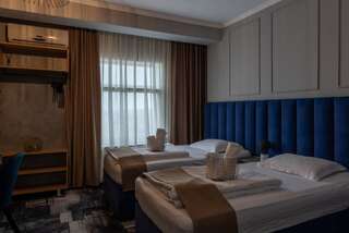 Отель Hotel PASO Клуж-Напока Двухместный номер Делюкс с 1 кроватью или 2 отдельными кроватями-3